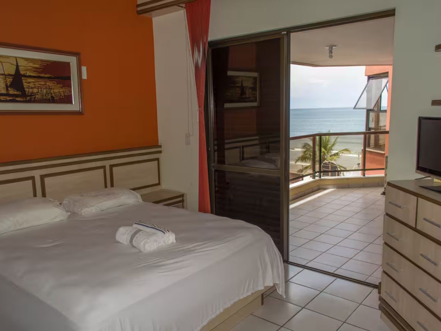 Quarto com vista mar pela varanda